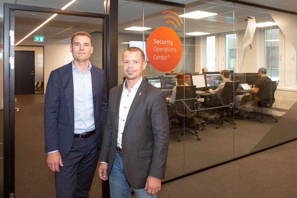 Nils-Erik Auråker, outsourcingdirektør i Sopra Steria sammen med sikkerhetssjef Ronald Barø i UDI (foto: Sopra Steria).